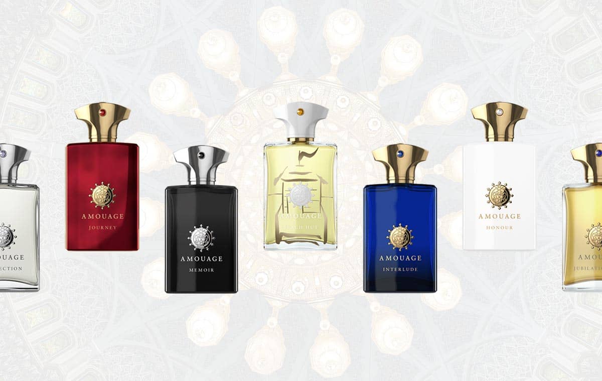7 different men's Amouage fragrance bottles lined-up in a row