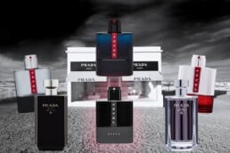 A selection of 6 different Prada colognes depicted in front of the Prada Marfa.