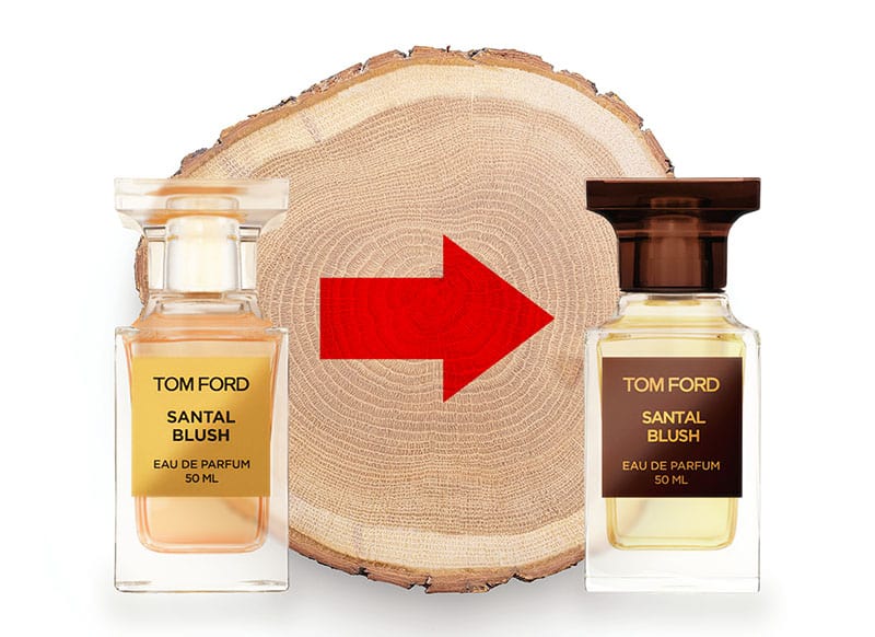 An older styled Tom Ford Santal Blush bottle beside a new, updated designed bottle. Both in front of the fresh cut end face of a wooden log, with a red arrow in-between them pointing from the old bottle design to the new bottle design.