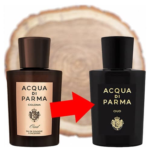 An older style Acqua di Parma Oud Colonia bottle beside a new, updated designed Acqua di Parma Oud Eau de Parfum bottle. Both bottles are in front of the fresh cut end face of an oud wooden log. A red arrow is in-between them pointing from the old bottle design to the new bottle design. 