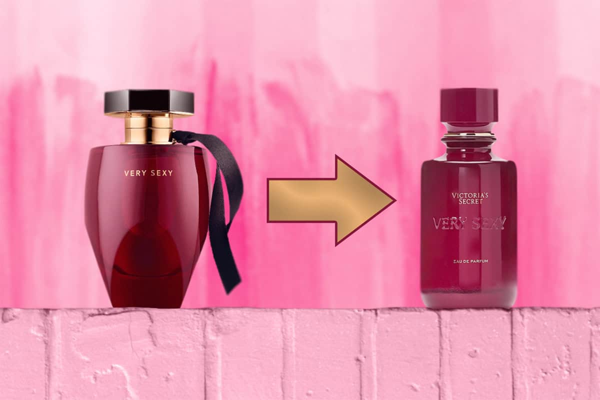 A close-up of the previous Victoria’s Secret Very Sexy EDP bottle sitting right next to the new, updated bottle. The old bottle is on the left side, and the new bottle is on the right side. Both bottles are sitting on top of a light pink colored brick wall. In-between the bottles is an arrow that is pointing in the direction of the new bottle on the right.